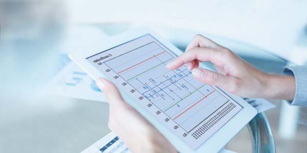 Tablet screen showing part of a proficiency testing scheme report with control chart with limit values and calculated uncertainties